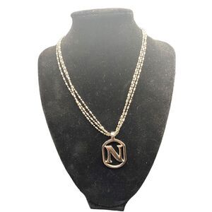 Three chain silver tone necklace with monogram “N” heart clasps